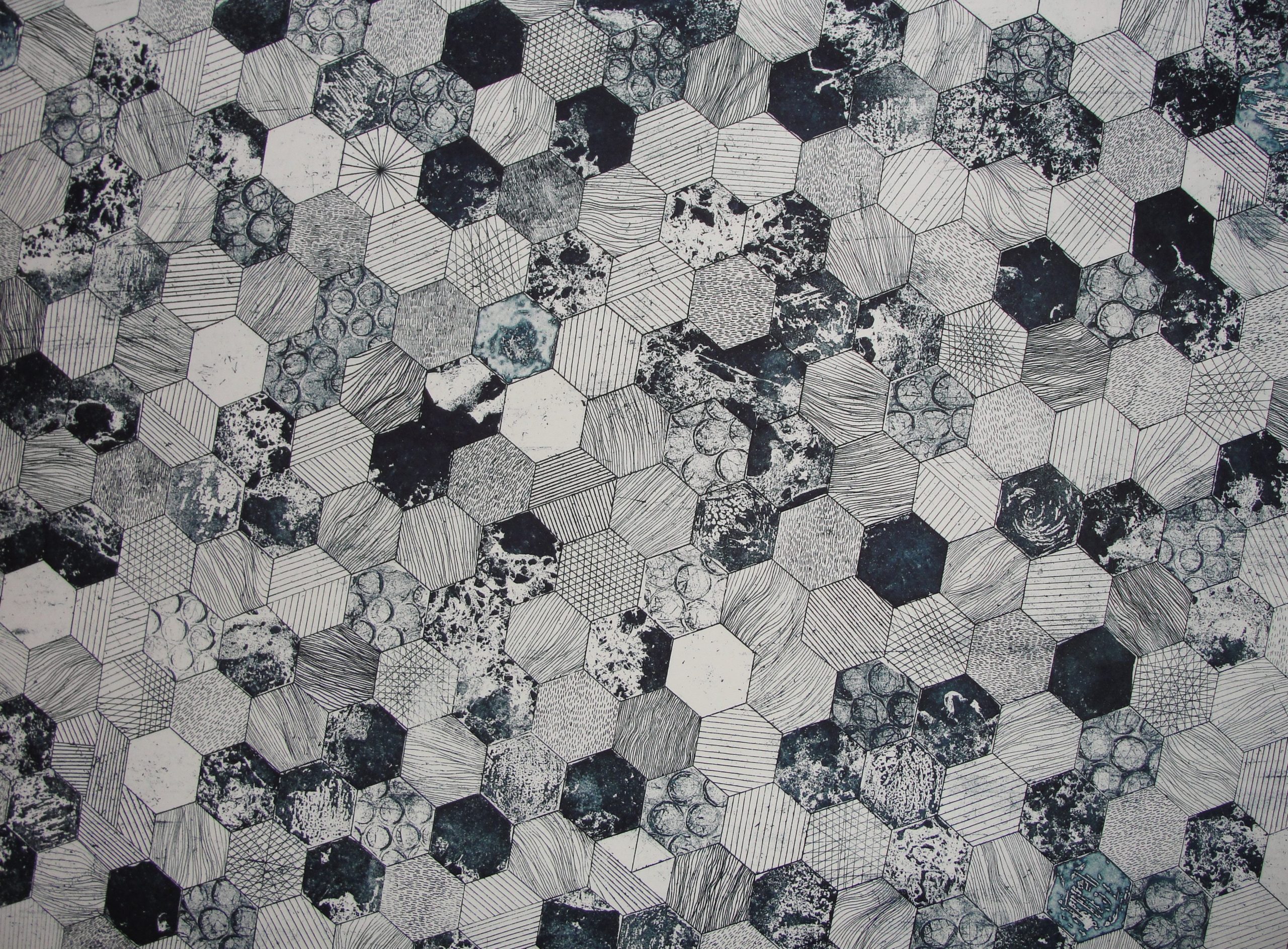 Hexagonal tiling with geometrical patterns laid on a floor